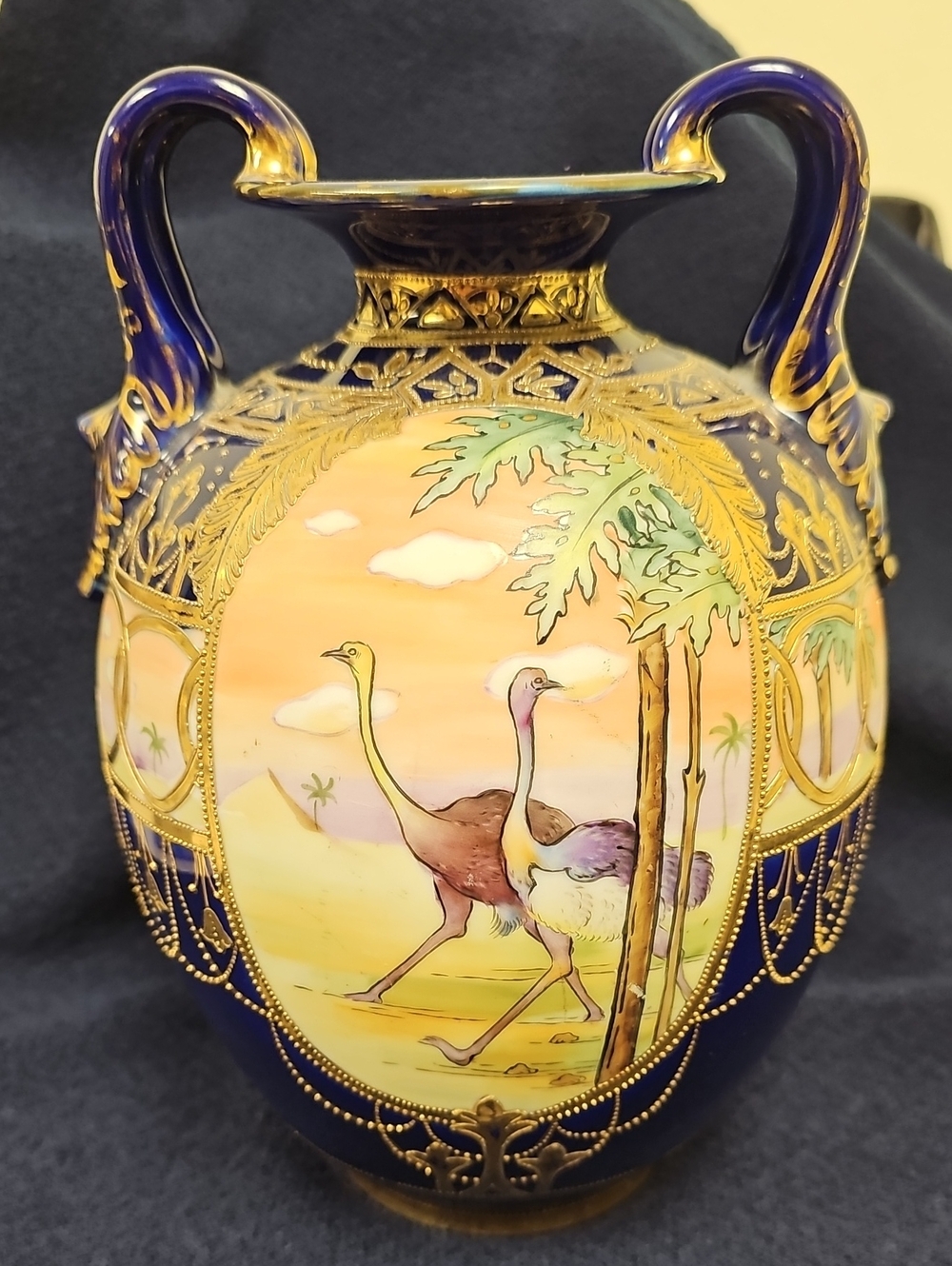 Antique Egyptian Themed Nippon Blue and Gold Gilt Porcelain Vase Ostrich Scene